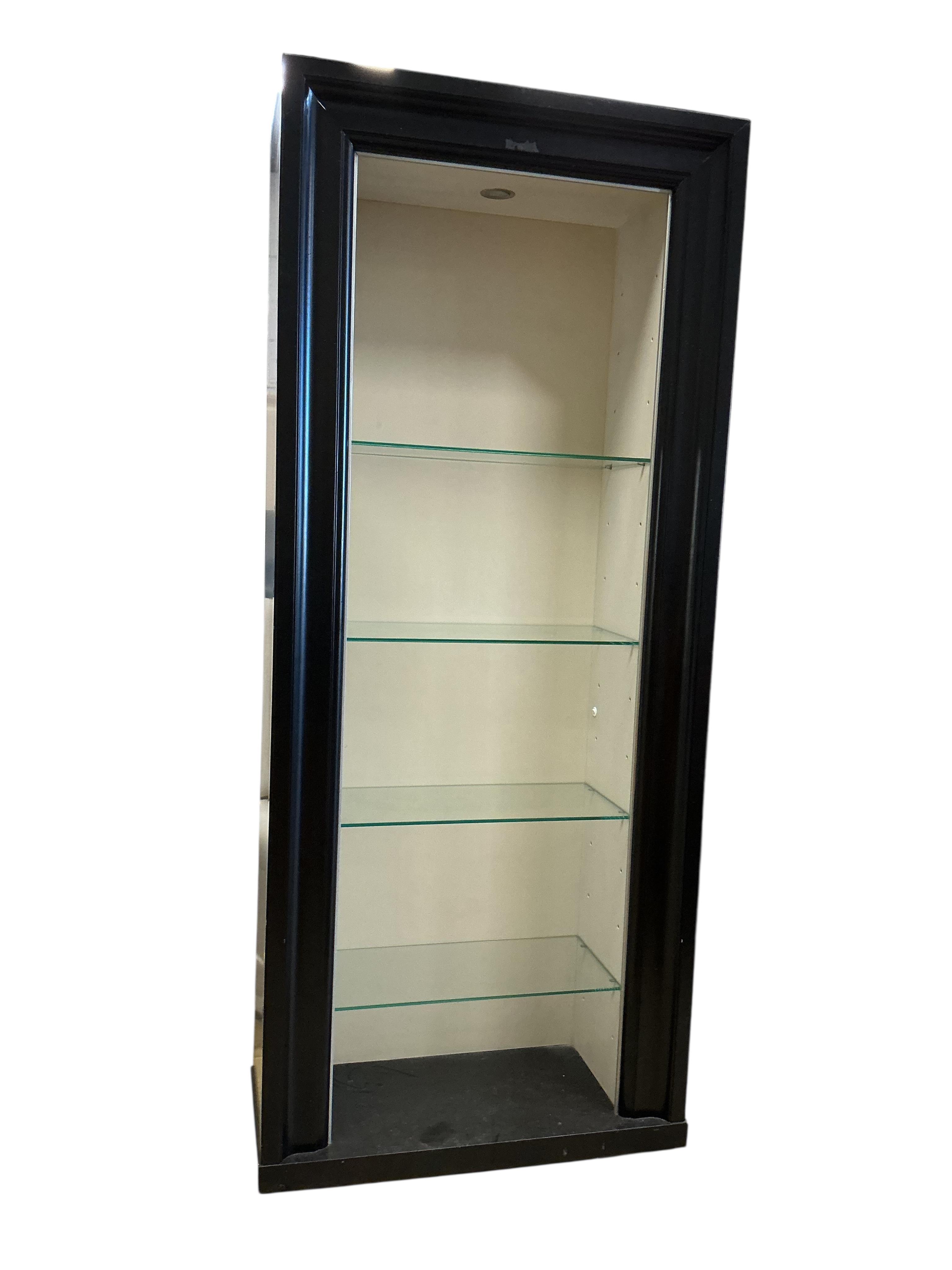 A pair of contemporary ebonised open display units, width 92cm, depth 39cm, height 217cm